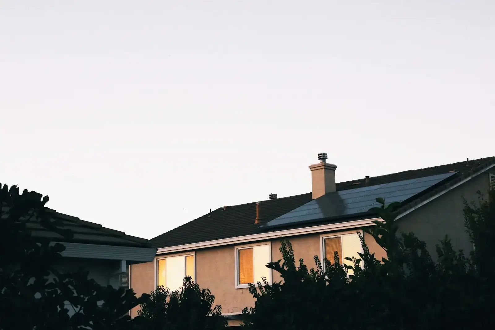 Single-family home with solar panels on the roof